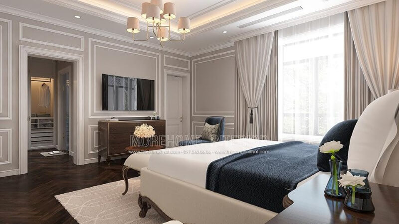 Sắp xếp nội thất phòng ngủ tân cổ điển có tủ quần áo đối diện giường ngủ khoa học, phong thủy. thiết kế thi công nội thất cao cấp