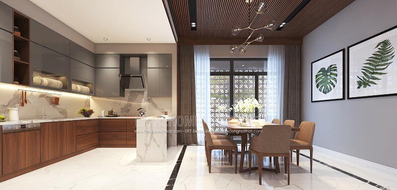Thiết kế nội thất phòng bếp liền phòng ăn sang trọng, độc đáo với nội thất gỗ chủ đạo từ tủ bếp, bộ bàn ghế, tường ốp gỗ tại biệt thự, nhà phố Vinh, Nghệ An. thiết kế thi công nội thất cao cấp